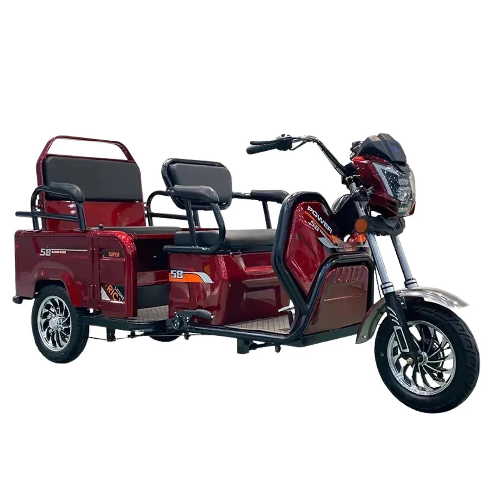 Red electric tricycle with two seats on a white background