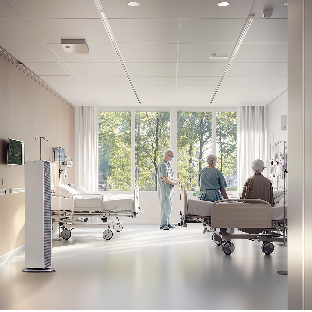 Modern hospital room with patients and staff near beds, large windows showing greenery outside.