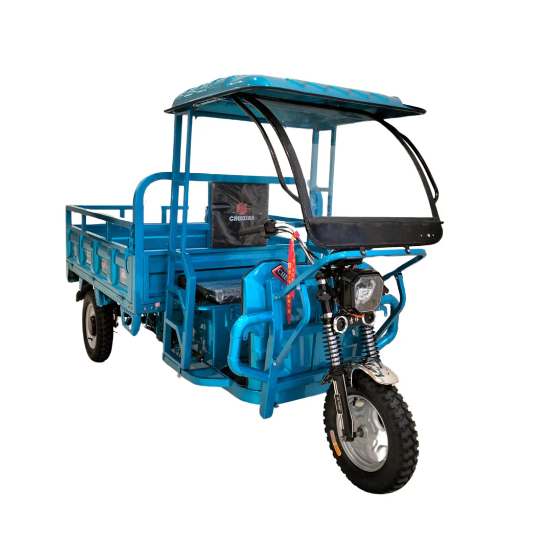 Blue three-wheeled vehicle with a canopy on a white background