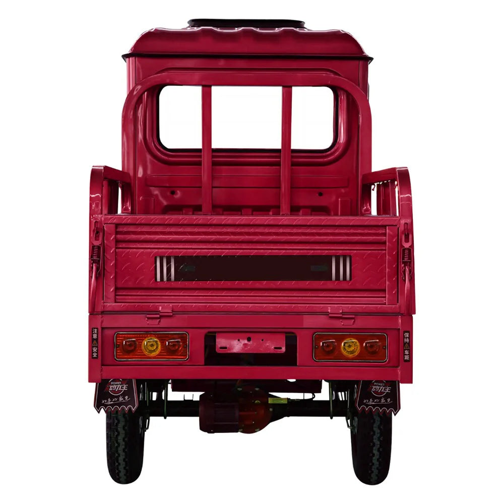 Red three-wheeled vehicle on a white background