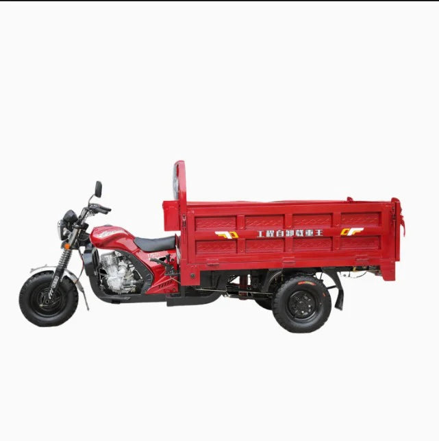 Red three-wheeled motorcycle with cargo bed on a white background