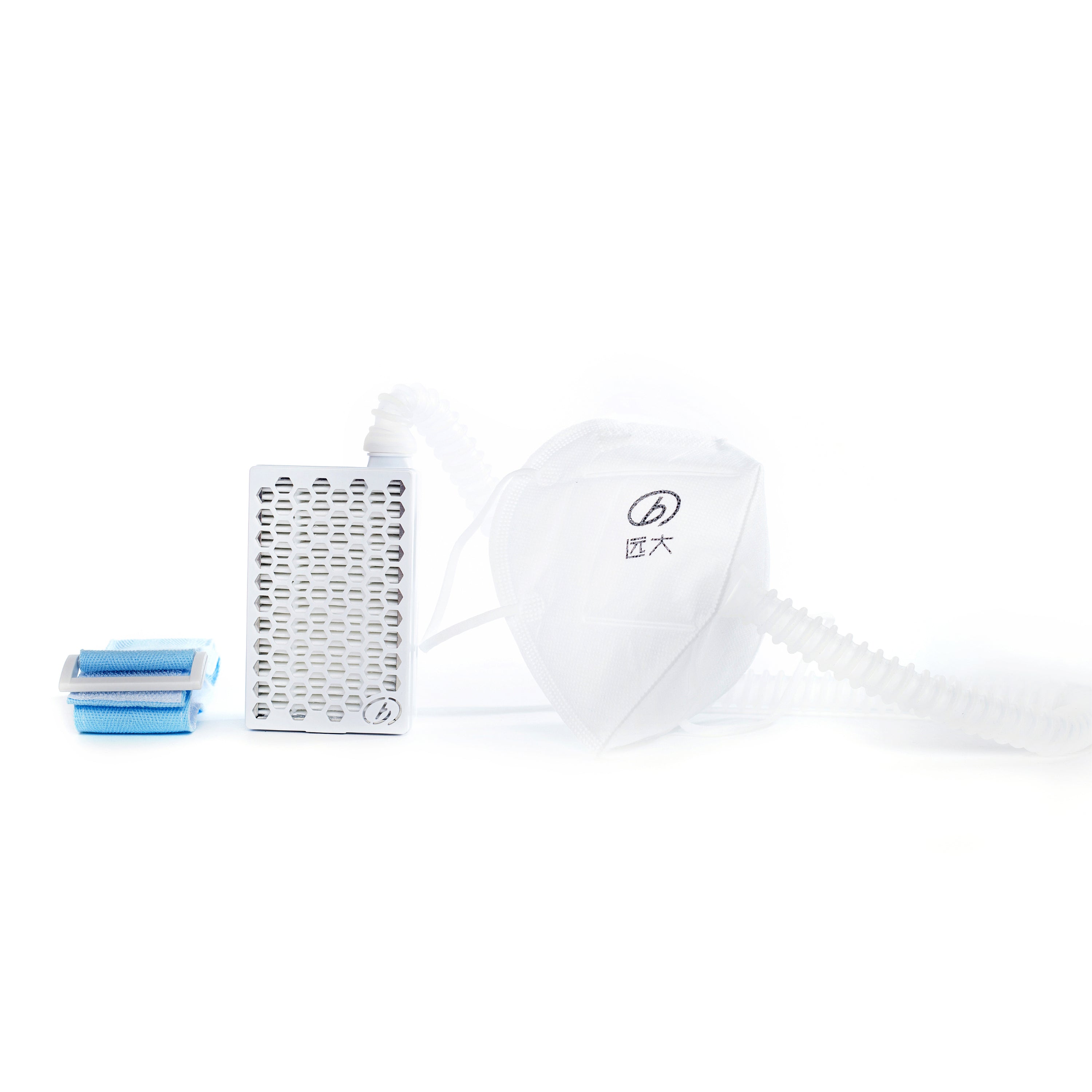Eyelash extension tools including a holder, tray, and small container on a white background